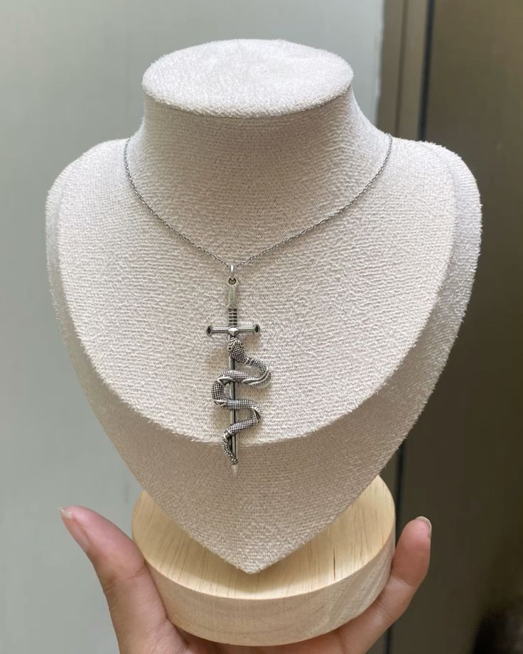 Snake sword pendant