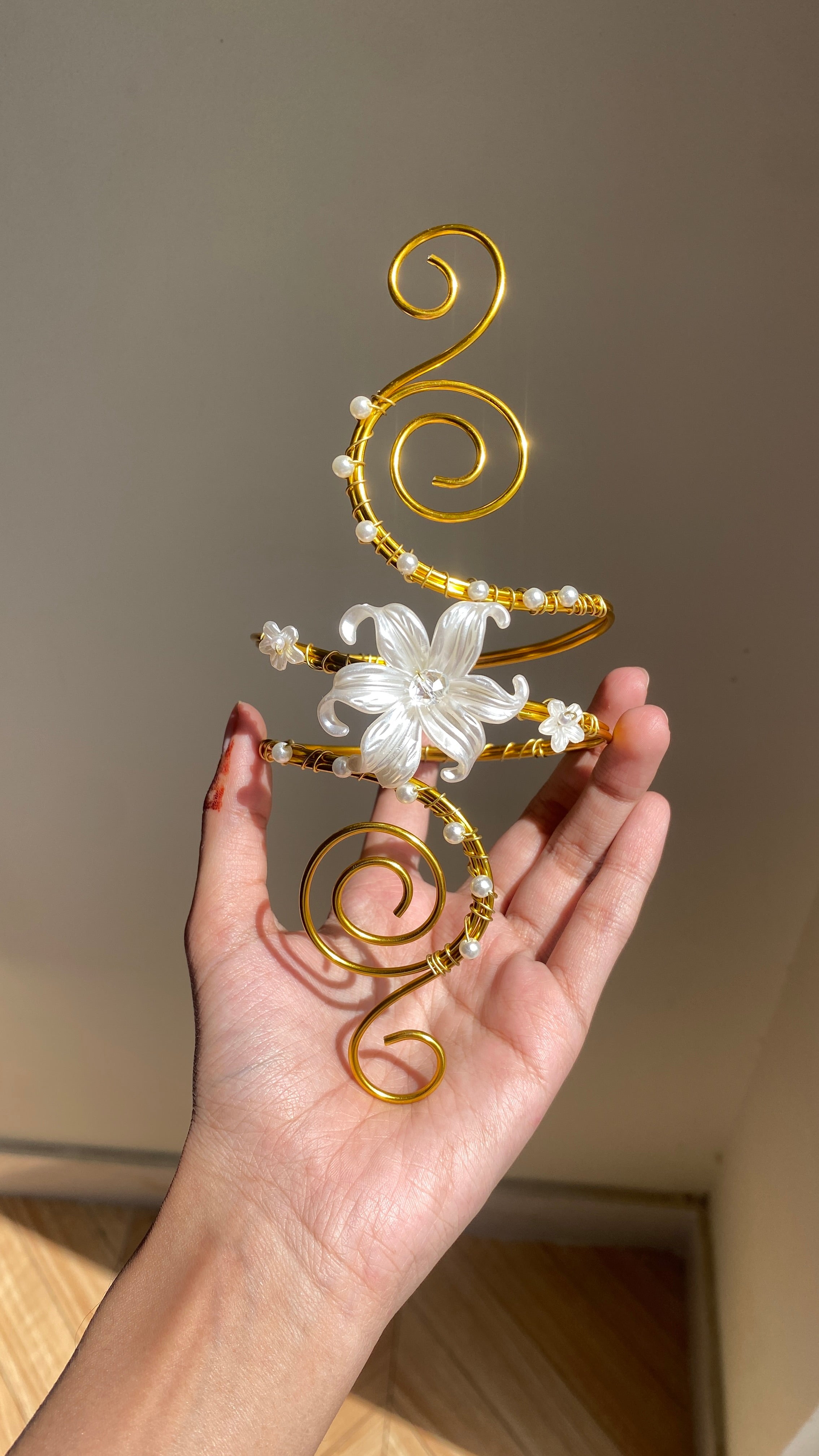 Golden spiral lily armcuff