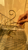 Golden curl armcuff