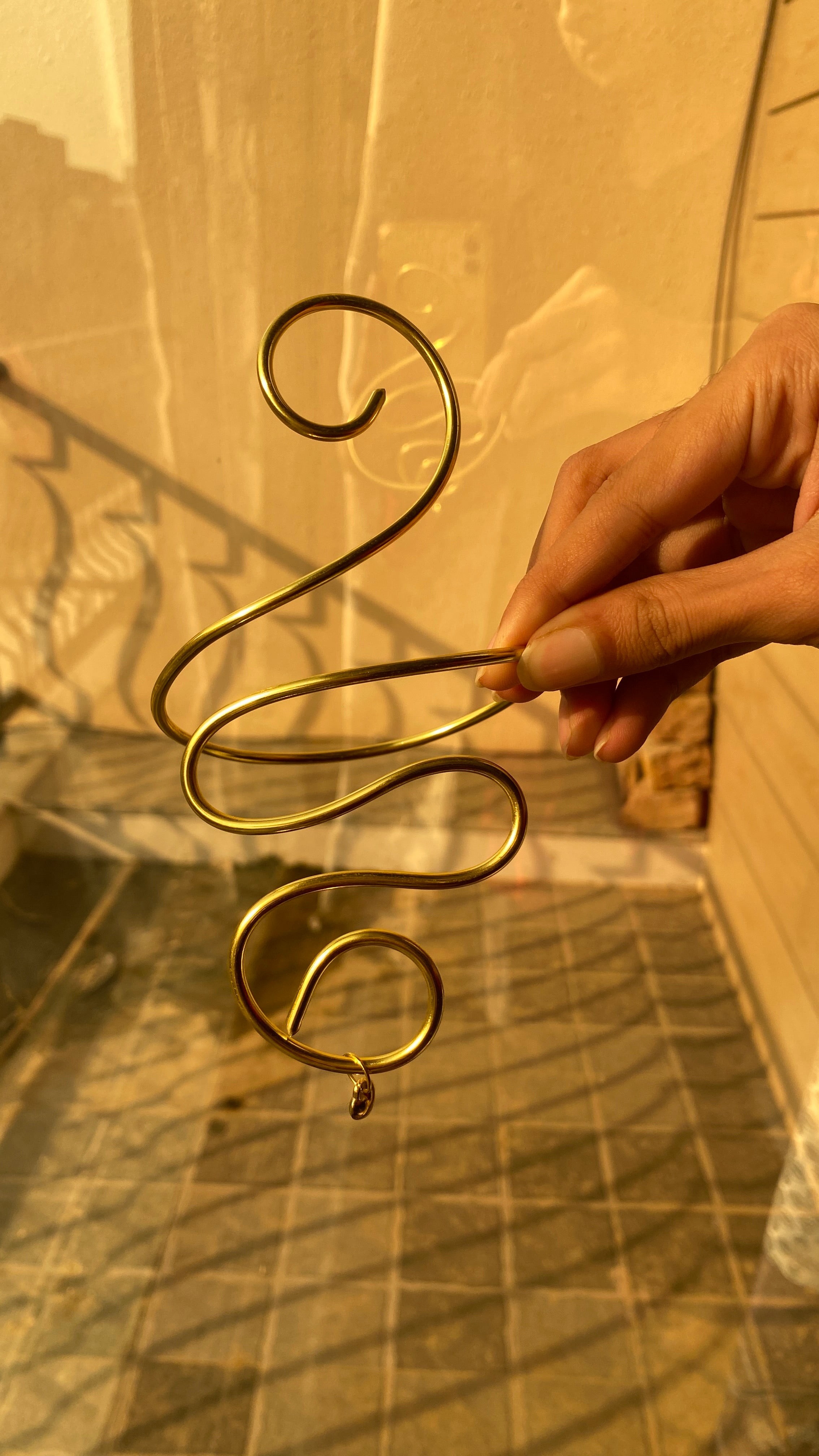 Golden curl armcuff