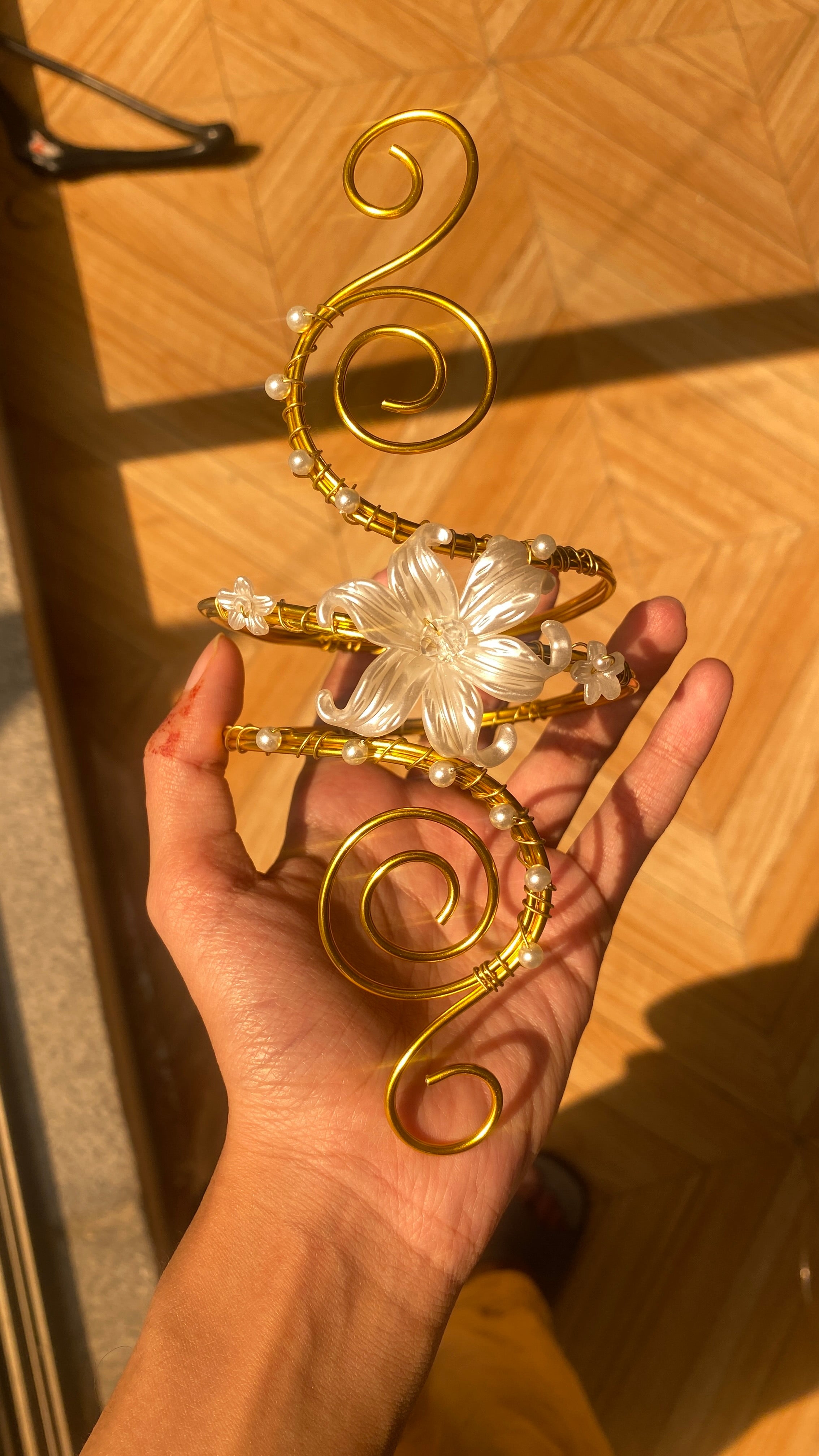 Golden spiral lily armcuff