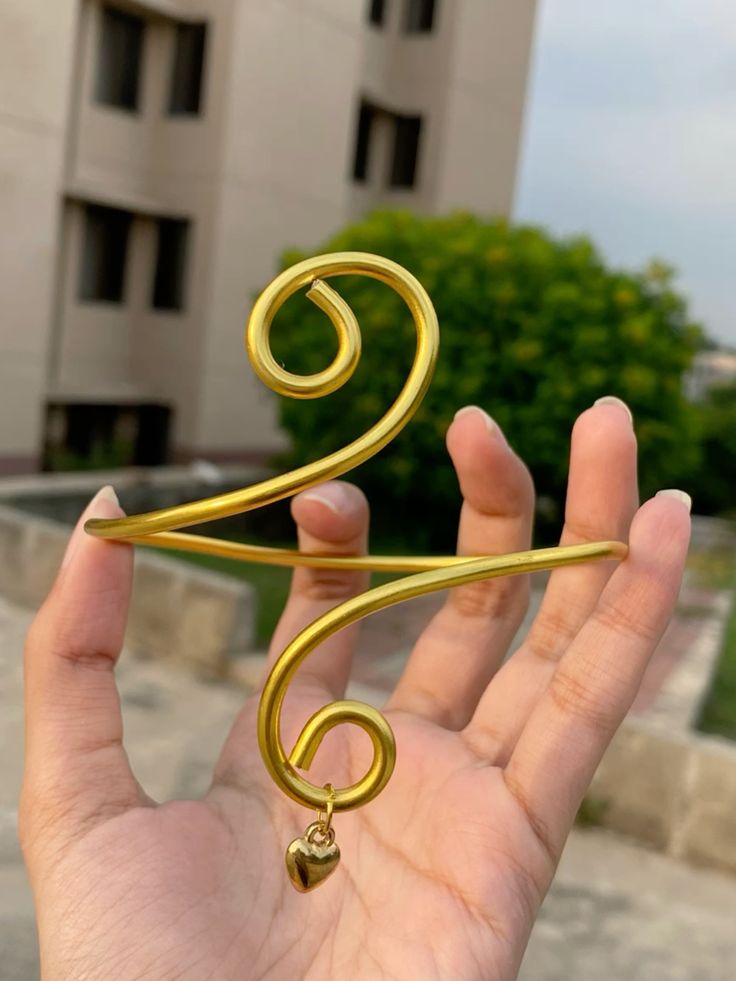 Golden heart arm cuff