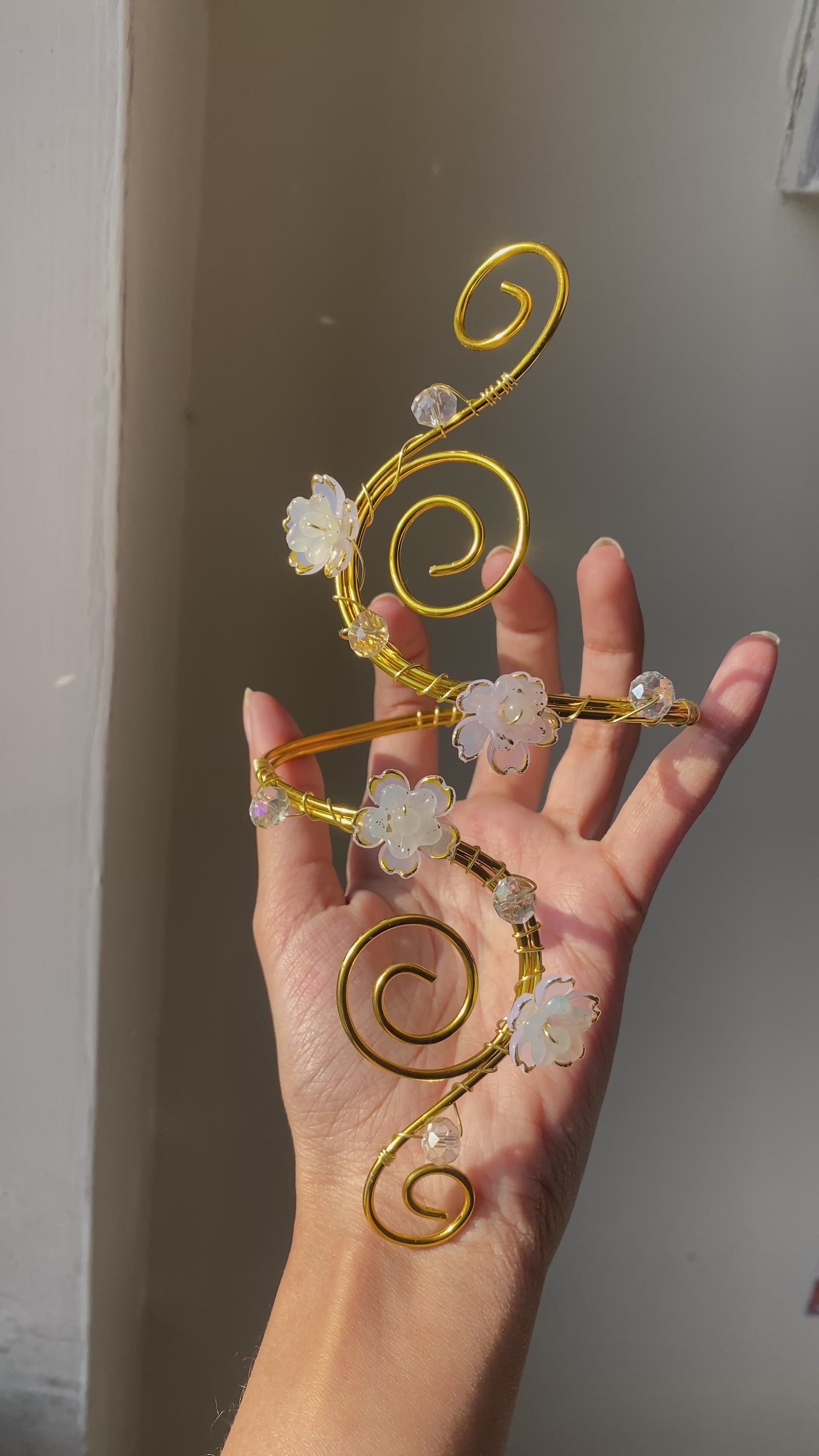 White spiral blossom armcuff